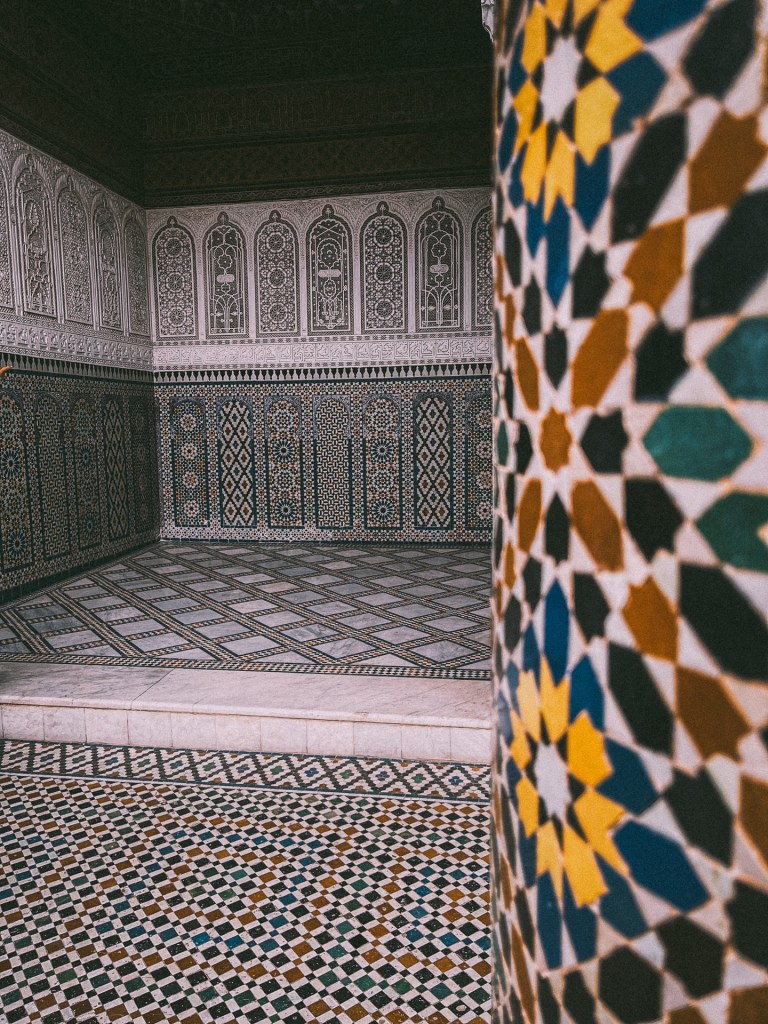 Intricate Moroccan tile patterns and architectural details inside a traditional building at Dar El Bacha Museum.