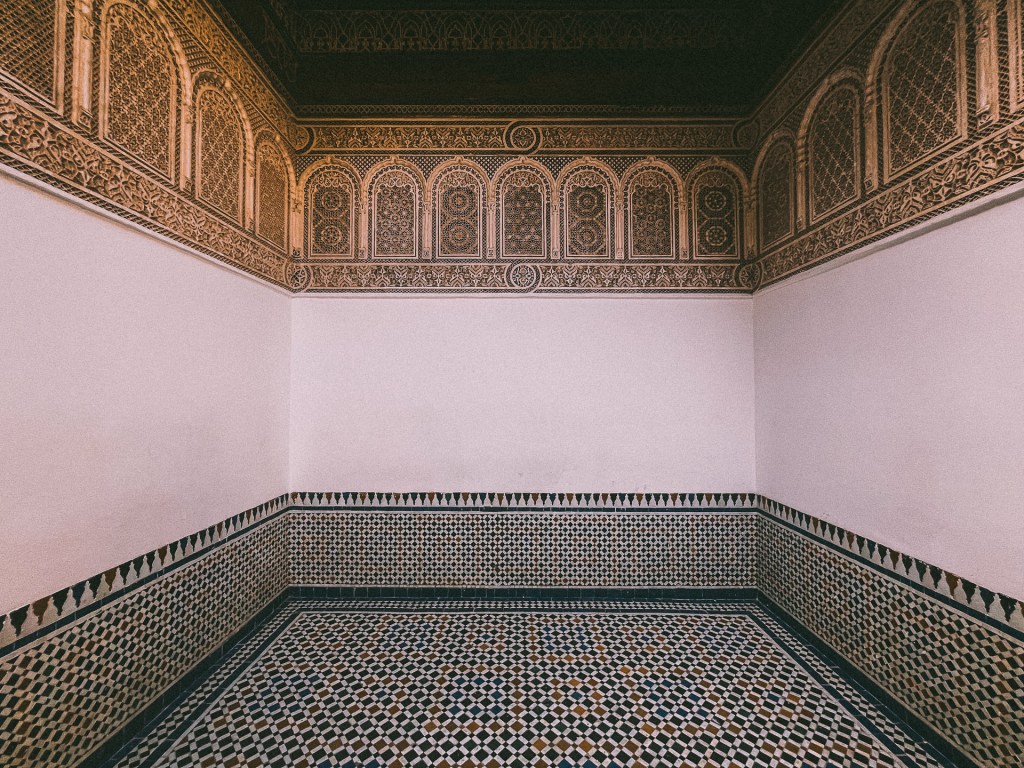 Interior of Bahia Palace building featuring intricate tile work and decorative wall patterns.